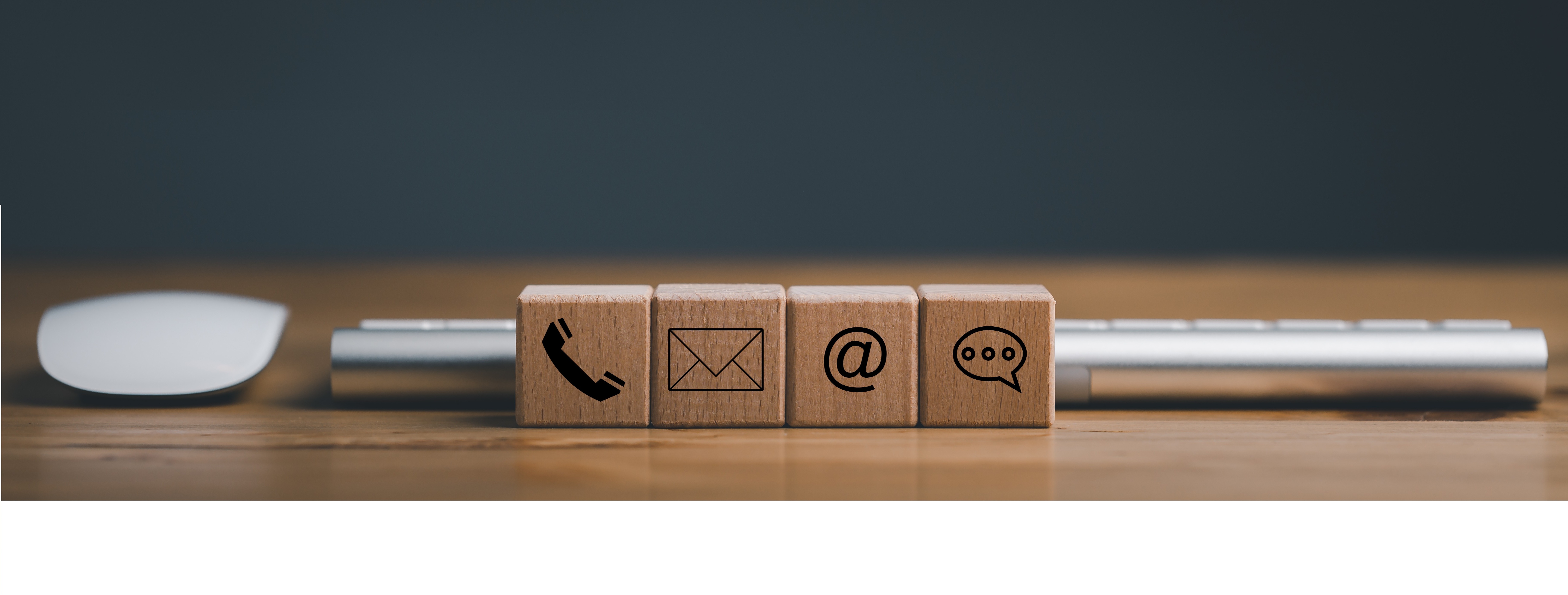 Communication Icons Including Call, Email, WhatsApp and SMS displayed on Four Cubes Respectively
